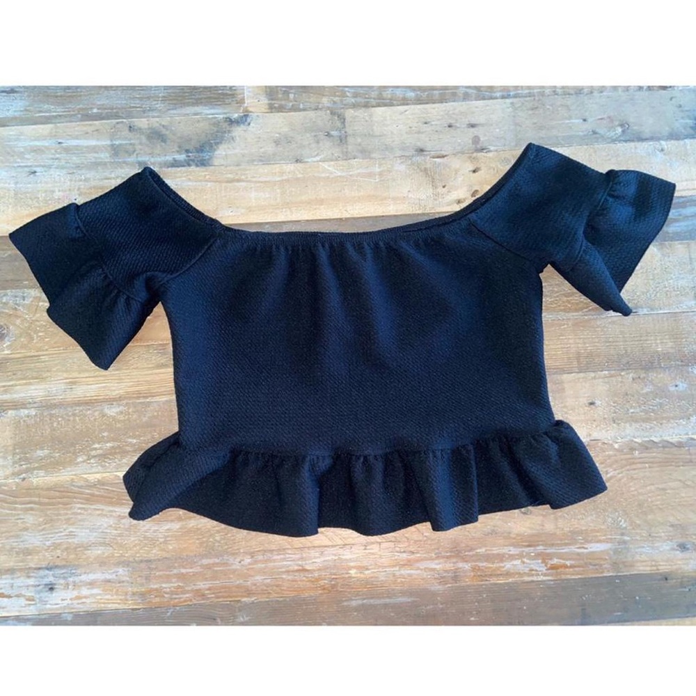 black off the shoulder crop top with flare details